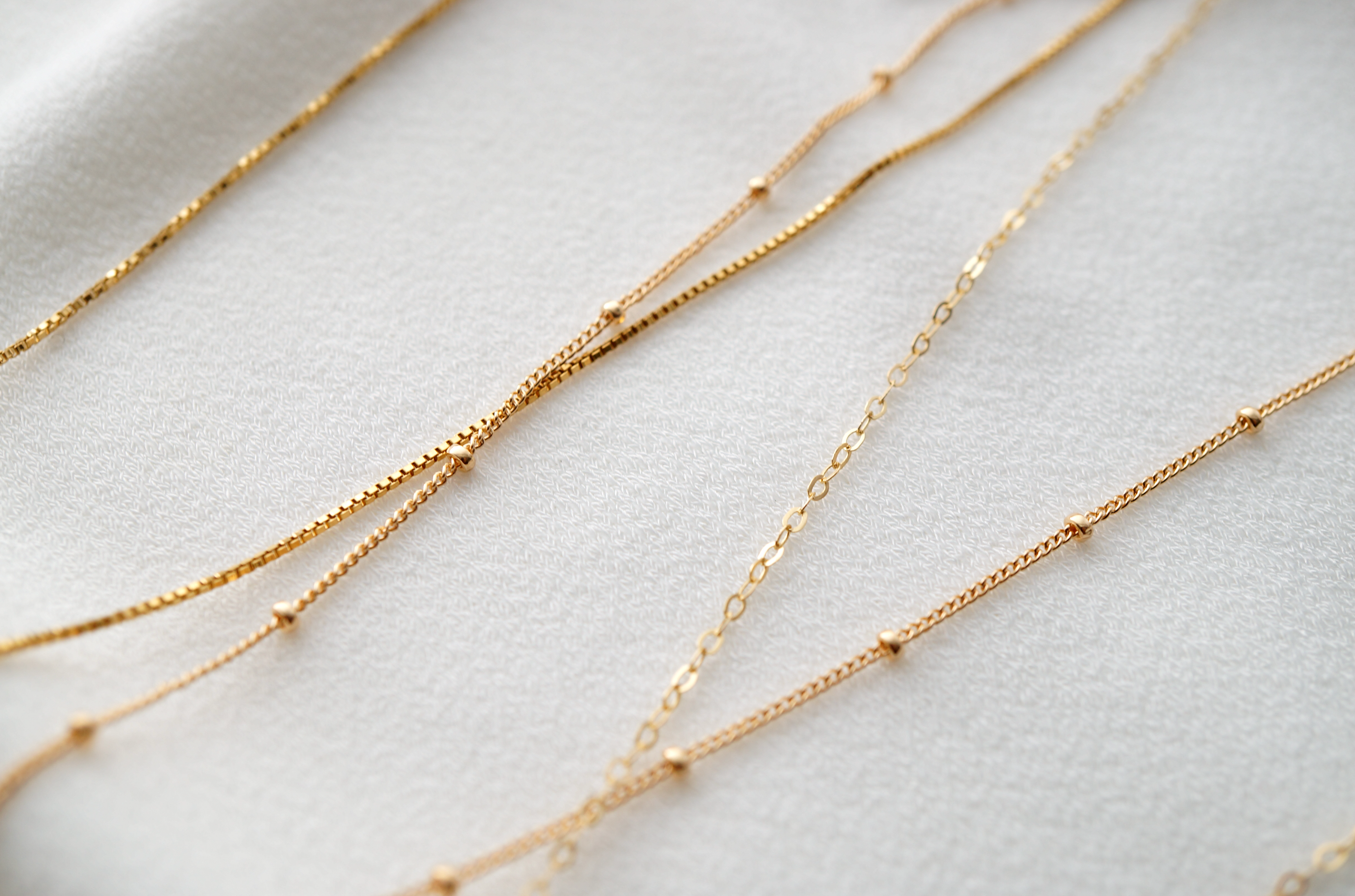 How to Layer Necklaces Like a Pro