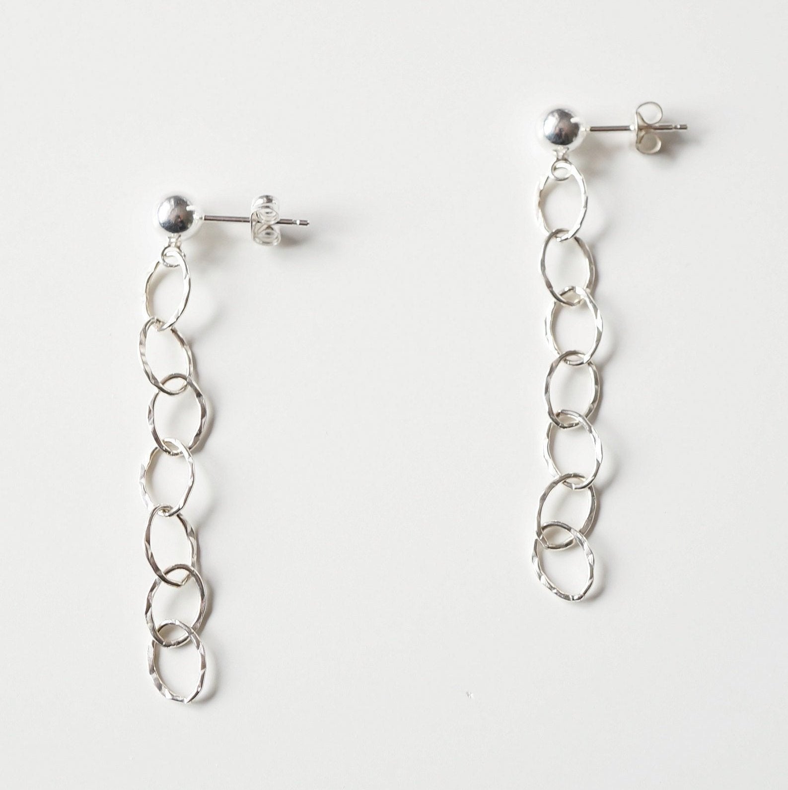 Silver textured loop earrings on sterling silver studs (Germaine)