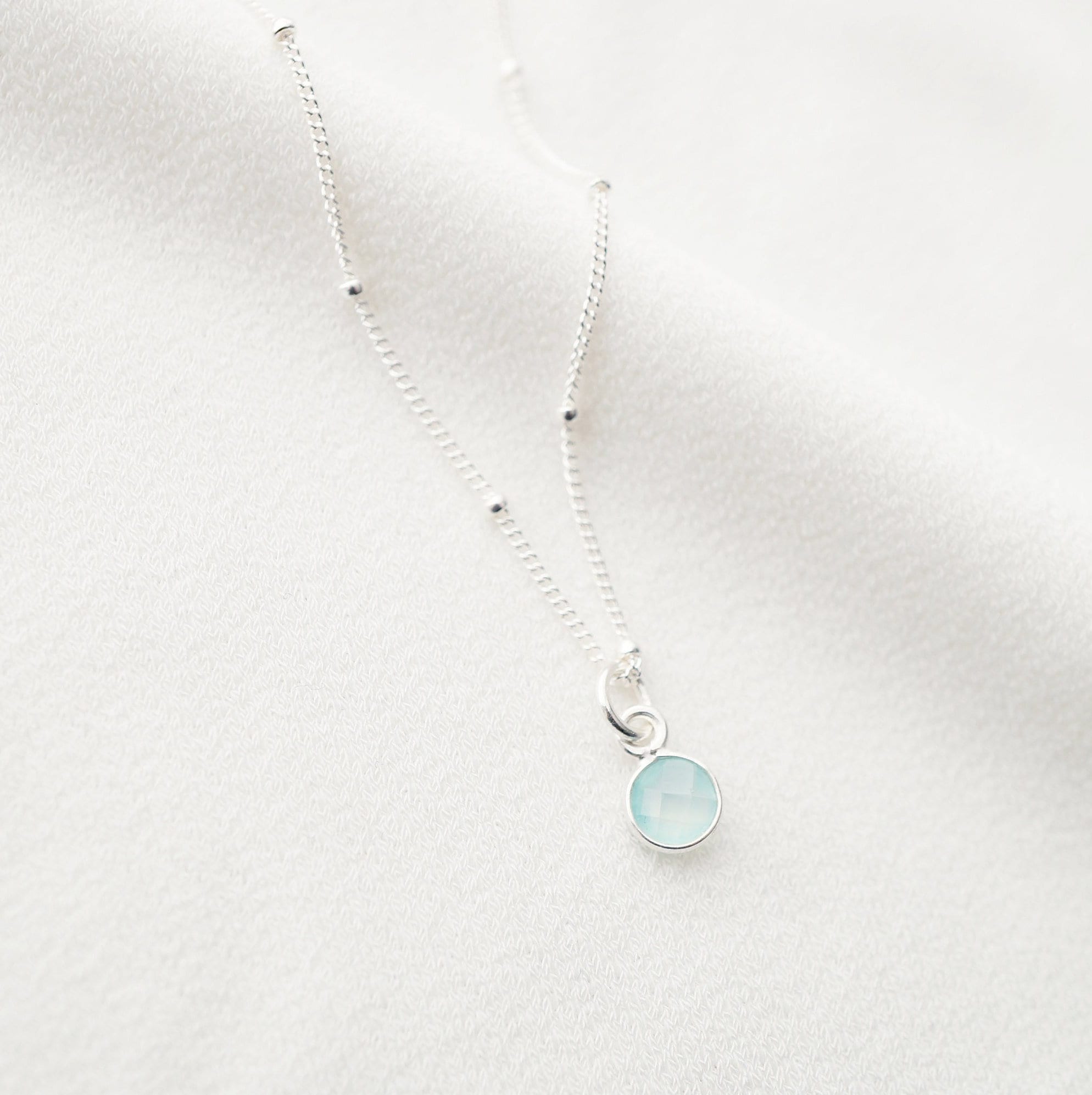 Tiny peridot stone on Sterling silver Necklace Cira Hunter Trove